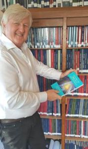 Roy with his copy of “Putting the soul back into business”