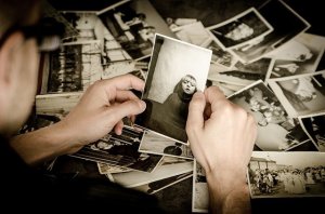 guy holding a photo