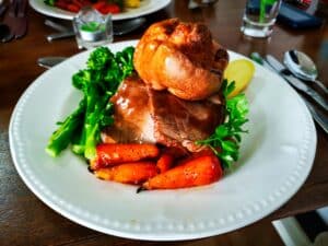 A nice roast dinner on a plate.