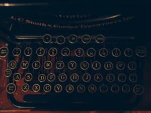 A close-up image of the keys of a typewriter.