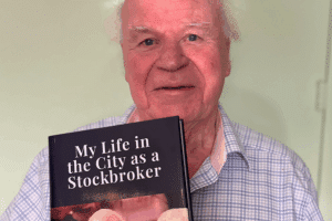 LifeBook Memoirs author Nicholas Pearson, OBE, and his LifeBook private autobiography, My Life in the City as a Stockbroker