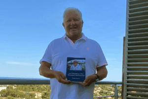 LifeBook author Philippe Chavaroc with his private autobiography, Les Tribulations d'un Auvergnat International