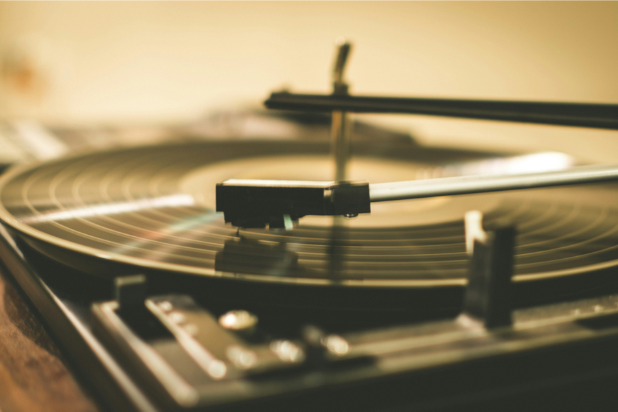A close-up of a record on a turntable.