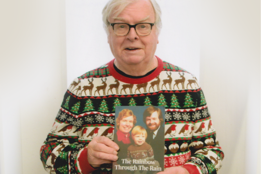Private autobiography author John Harris holding his LifeBook