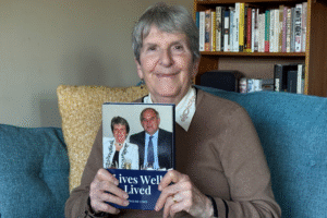 Pauline Lewis with her LifeBook private autobiography, Lives Well Lived.