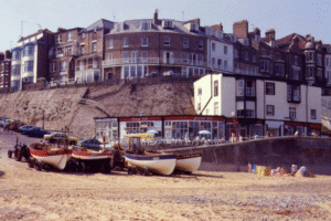 An old 1960s or 1970s photograph of a British seaside town.