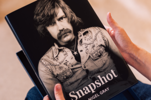 Hands holding a completed LifeBook Memoirs private autobiography.